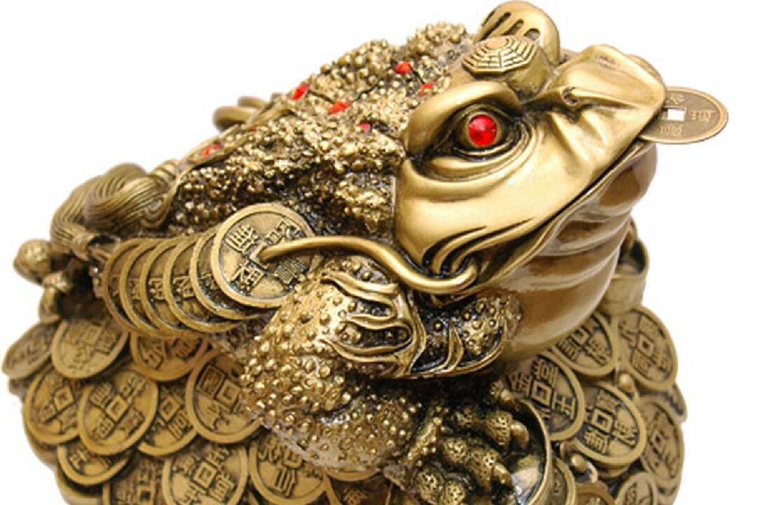 Money toad with ancient Chinese coins - amulet for wealth