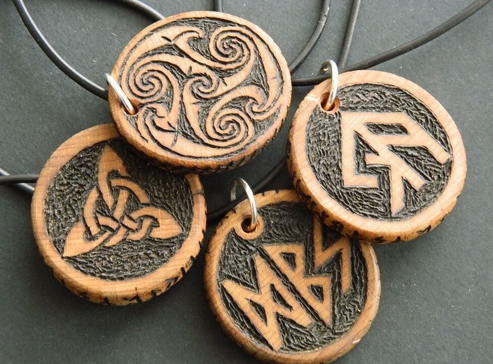 Pendant with runes for luck